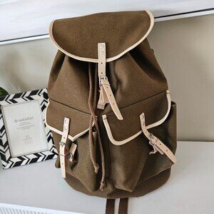 Uniqlo Canvas and Leather Drawstring Backpack in like new condition